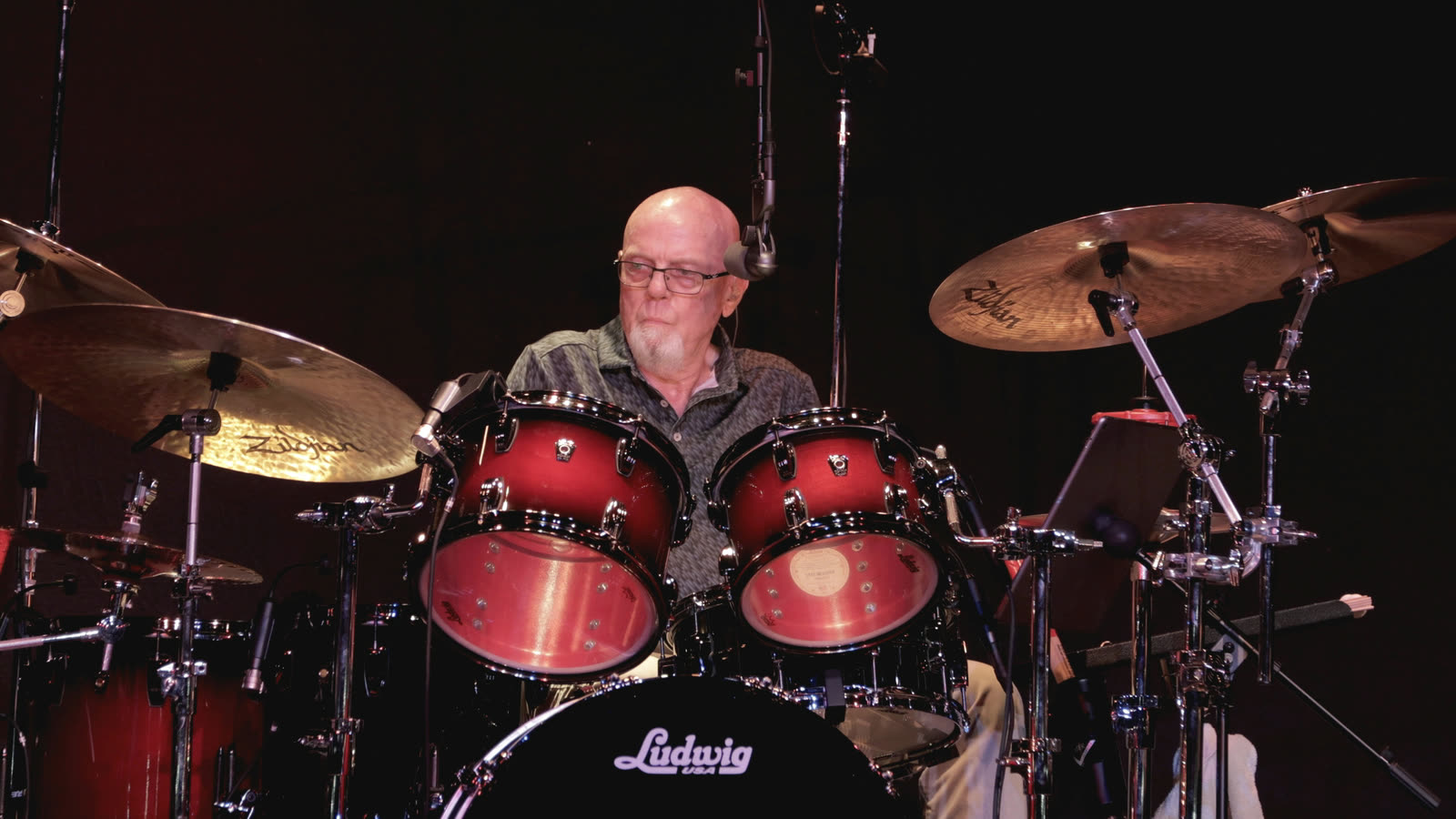 Ed on drums, close up.
